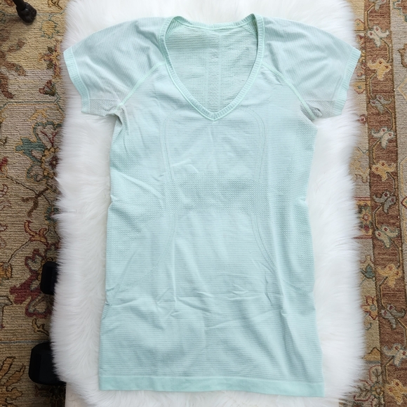 lululemon athletica Tops - Women's Lululemon athletica short sleeve v-neck swiftly tech workout shirt